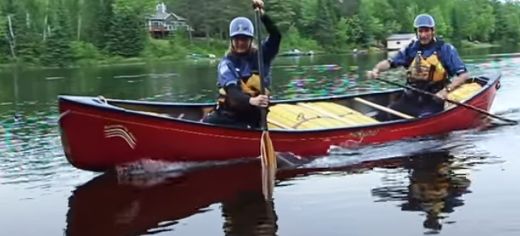 A photo of a canoe in moving water.